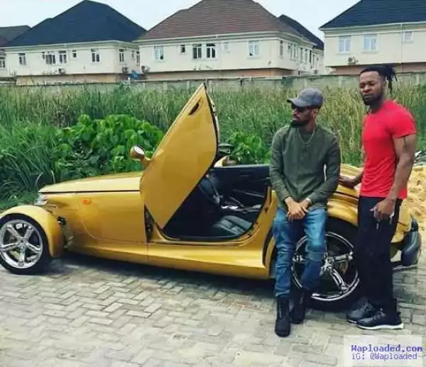 Flavour Flaunts His Muscle As He Pictured With Phyno On That Same Exotic Car